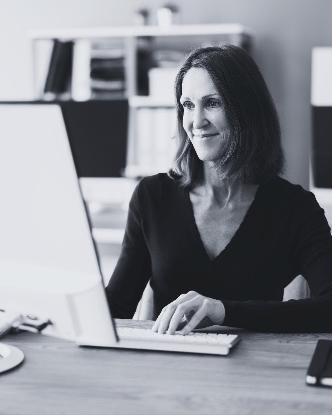 A woman working on a laptop