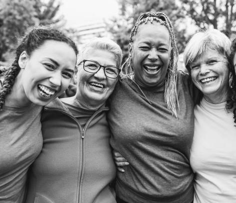 A Group of Women Smiling From Mid-Life Reboot Event